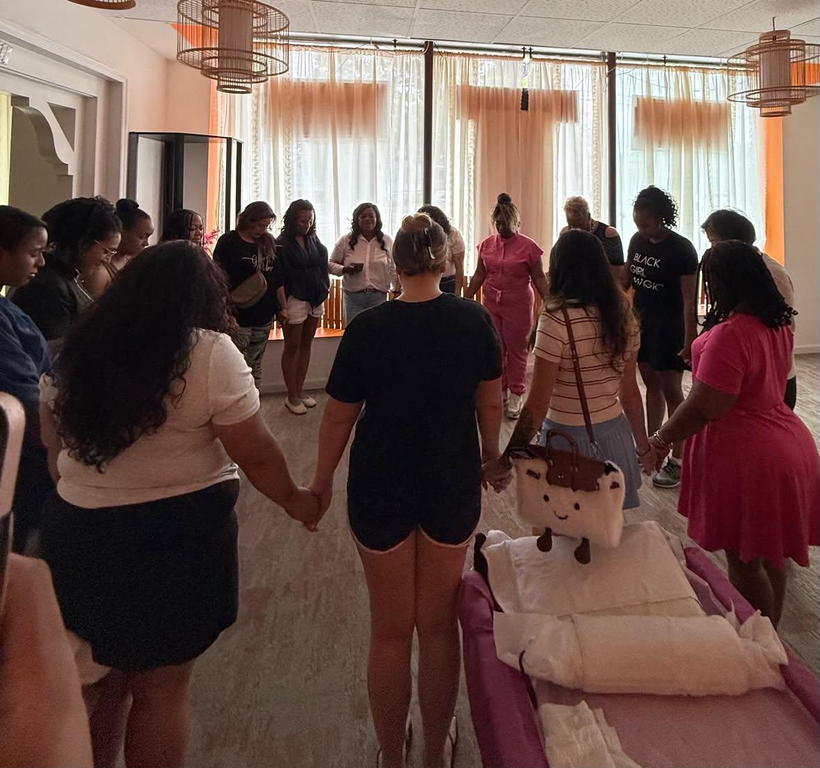 EMassage team gathering in a welcoming spa environment