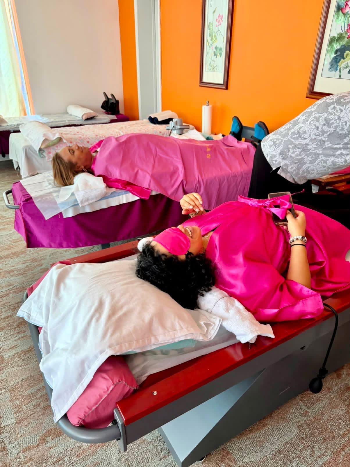 Guests relaxing during an EMassage spa party in Augusta